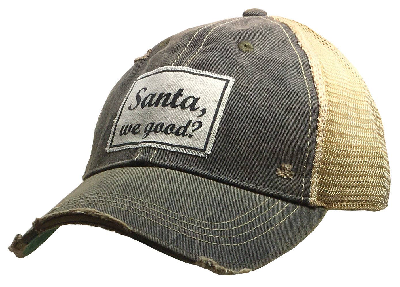 A black distressed trucker cap with 'Santa, we good?' text printed on the front.